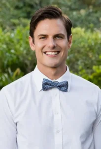 portrait-of-groom-and-groomsmen-standing-with-hand